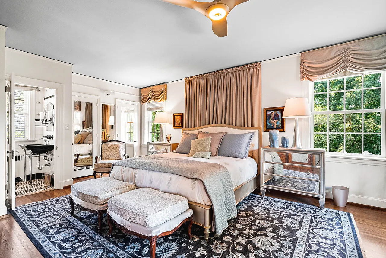 Blurred abstract background interior view looking out toward to empty office lobby and entrance doors and glass curtain wall with frame - blue white balance processing style